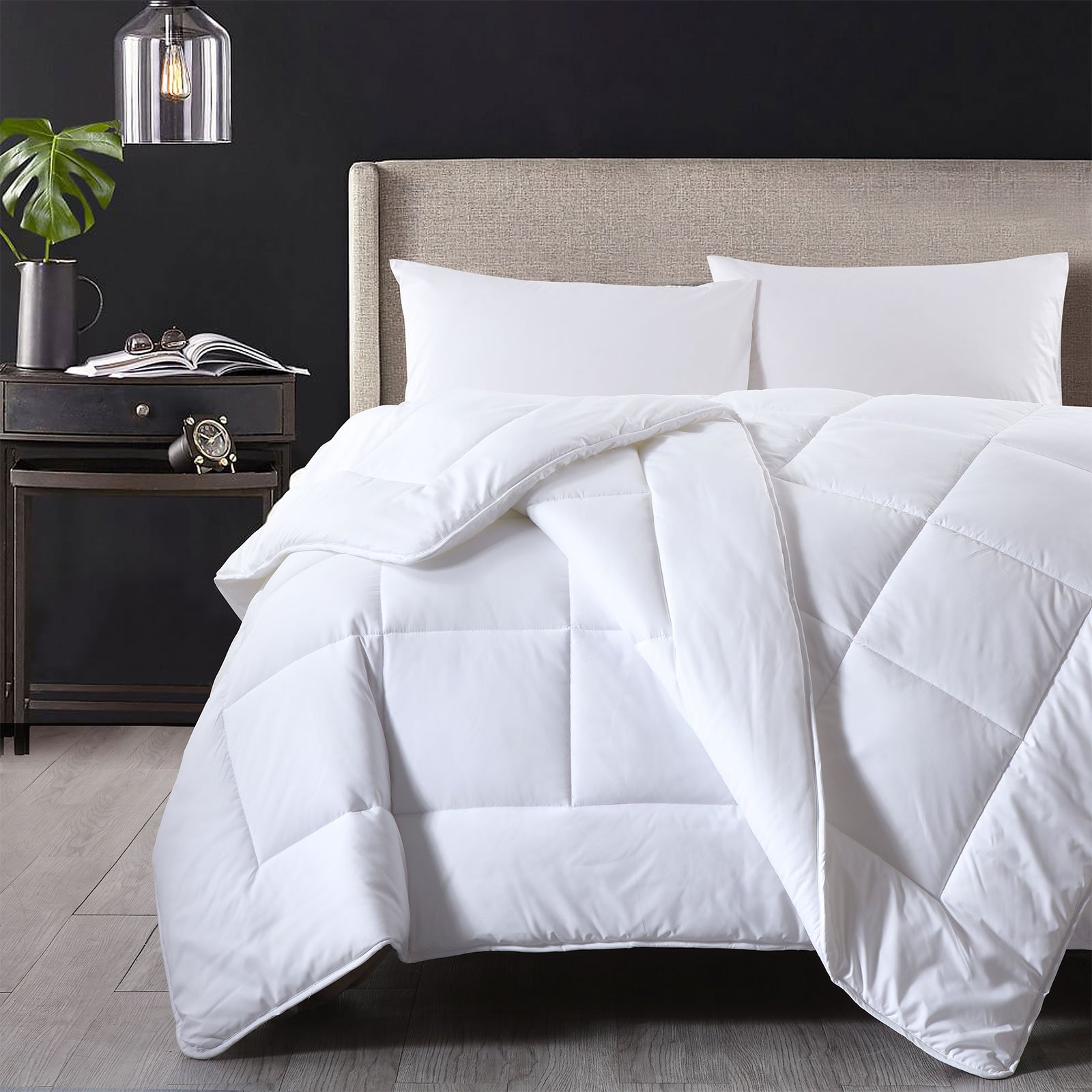 Royal Comfort 260GSM Deluxe Eco-Silk Touch Quilt with 100% cotton cover, showcasing its luxurious texture and lightweight design.